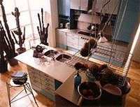 Revija KUHINJE in JEDILNICE (slika str. 16)